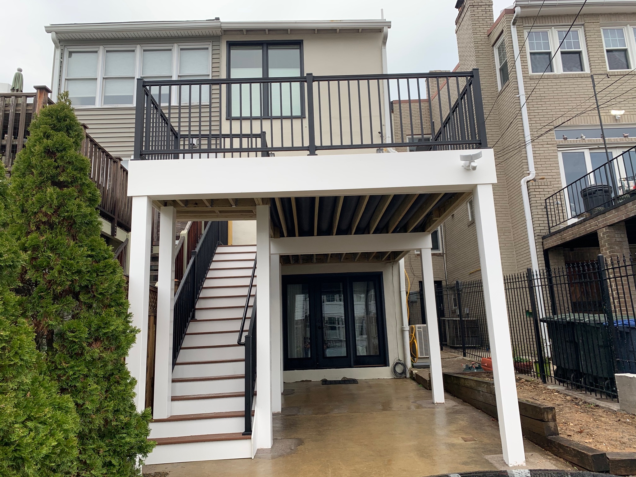 A house with a staircase leading to a second story