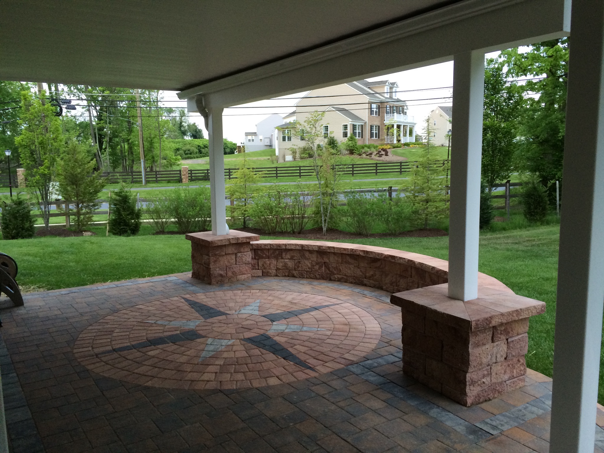 A patio with a bench and a star on it