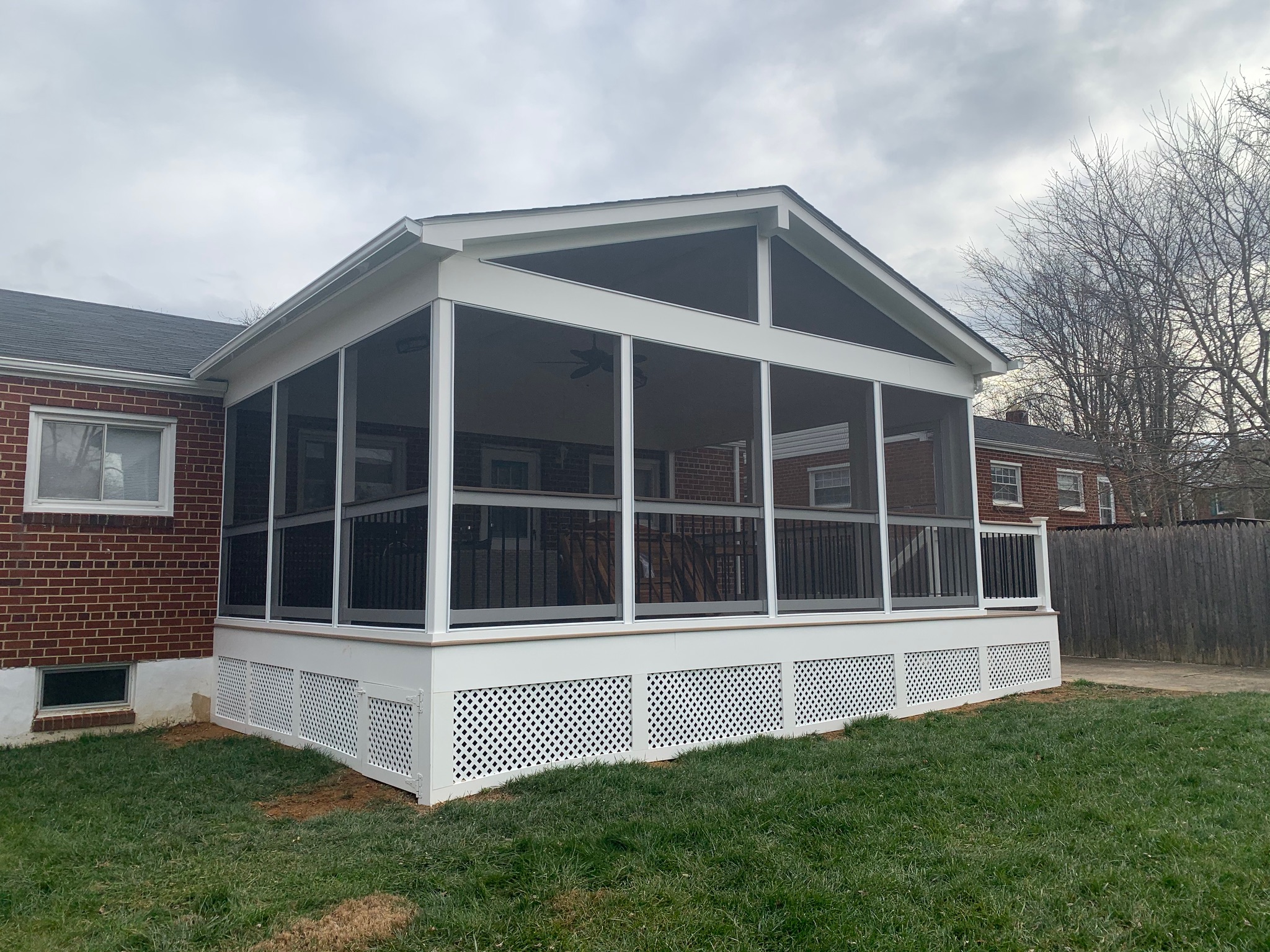 A screened in porch with a screened in porch