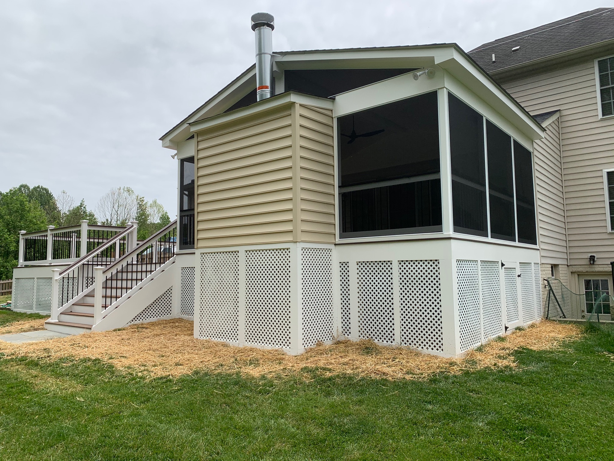 A house with a screened porch and stairs