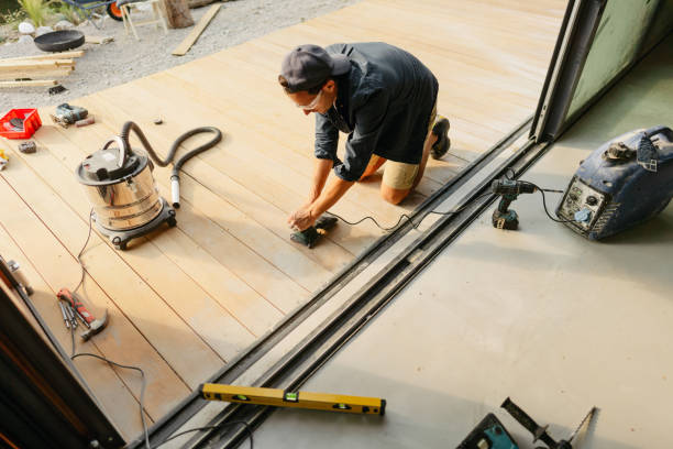 Large custom backyard deck installed behind upscale Potomac home for outdoor entertaining